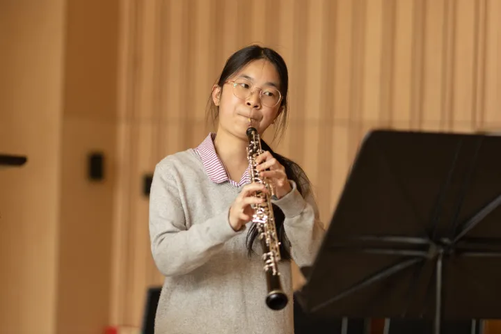 Student playing the oboe