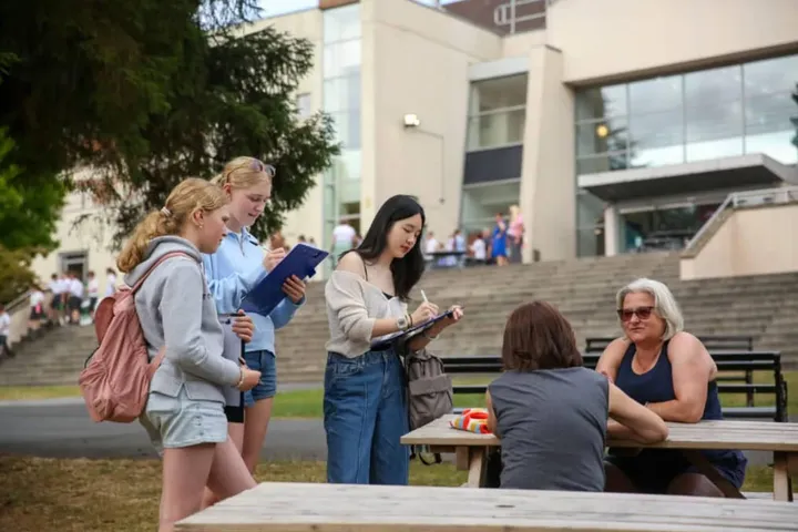 Students at an outdoor table