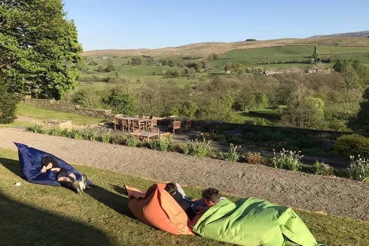 Students relaxing in the garden